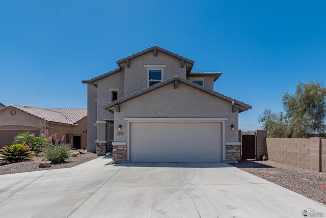 6533 E 35th Pl, Yuma, AZ 85365 - view of front of home with stone siding, driveway, and stucco siding
