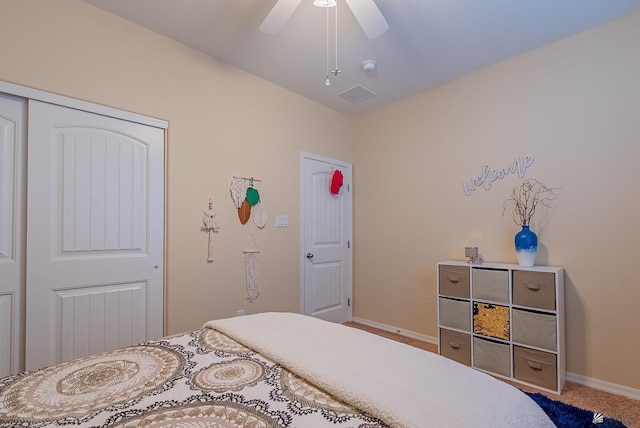 6533 E 35th Pl, Yuma, AZ 85365 - carpeted bedroom featuring baseboards, a closet, and a ceiling fan