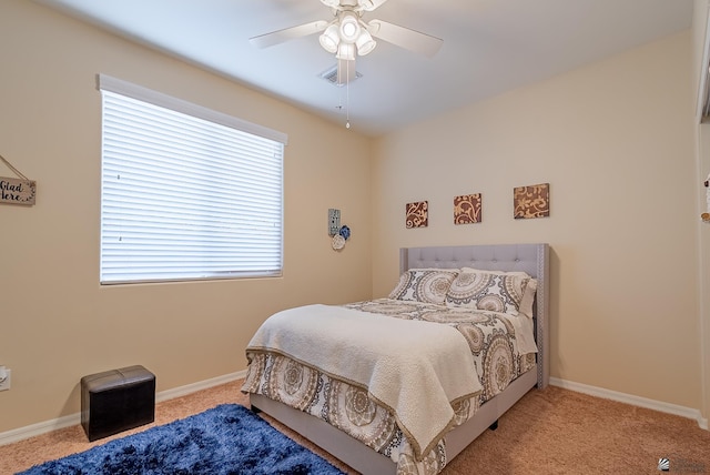 6533 E 35th Pl, Yuma, AZ 85365 - bedroom with carpet flooring, baseboards, and a ceiling fan