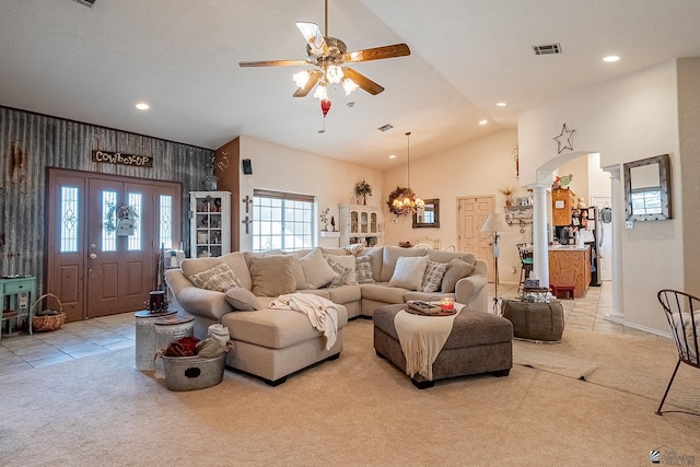 living area featuring visible vents, tile patterned flooring, ceiling fan, recessed lighting, and vaulted ceiling