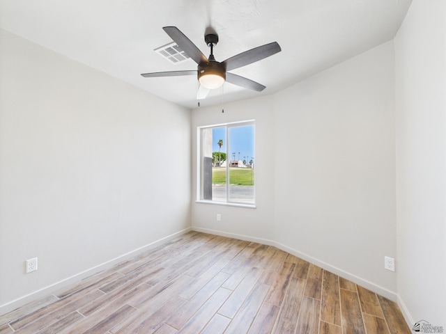 12116 E Calle Del Cid Unit B, Yuma, AZ 85367 - empty room featuring wood finished floors and a ceiling fan