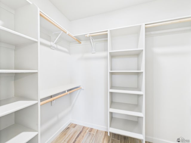 12116 E Calle Del Cid Unit B, Yuma, AZ 85367 - walk in closet with wood finished floors