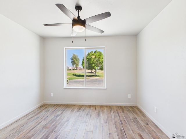 12116 E Calle Del Cid Unit B, Yuma, AZ 85367 - empty room featuring wood finished floors and ceiling fan