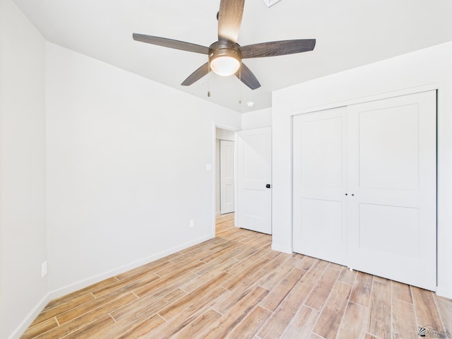 12116 E Calle Del Cid Unit B, Yuma, AZ 85367 - unfurnished bedroom featuring light wood-style flooring, a closet, and ceiling fan