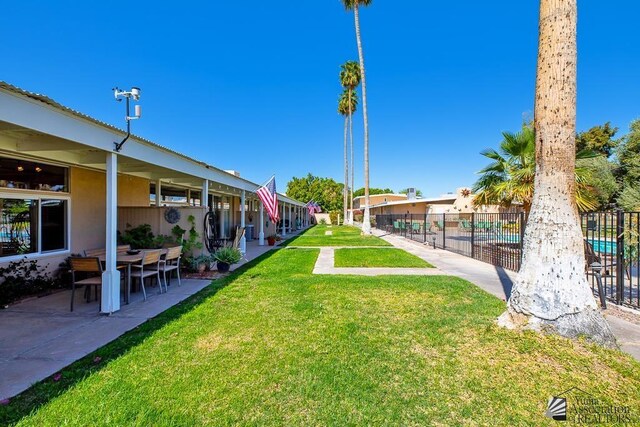 500 E Country Club Dr # 14, Yuma, AZ 85365 - view of yard with fence and a patio area