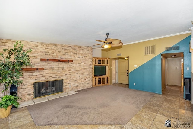 500 E Country Club Dr # 14, Yuma, AZ 85365 - unfurnished living room with a ceiling fan, baseboards, visible vents, and a stone fireplace