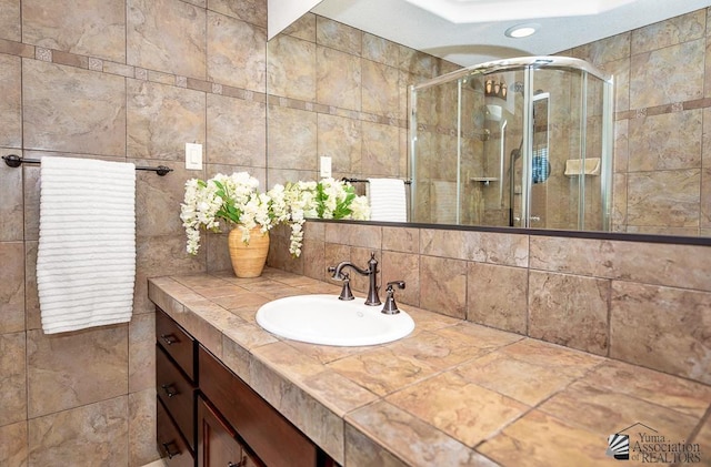 500 E Country Club Dr # 14, Yuma, AZ 85365 - bathroom with recessed lighting, tile walls, a shower stall, and vanity