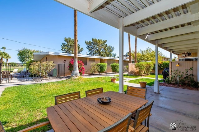 500 E Country Club Dr # 14, Yuma, AZ 85365 - view of patio / terrace with outdoor dining area and fence