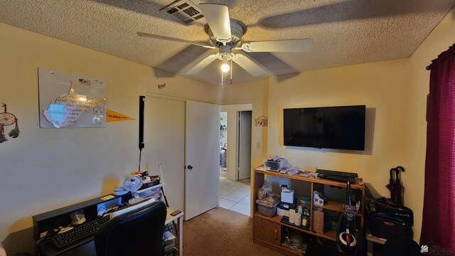 4671 W 21st Ln, Yuma, AZ 85364 - office area with ceiling fan, carpet, and a textured ceiling