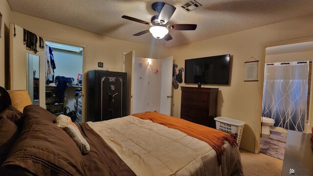 4671 W 21st Ln, Yuma, AZ 85364 - carpeted bedroom with a textured ceiling and ceiling fan