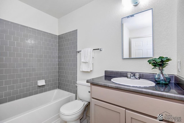 bathroom with vanity, shower / bathtub combination, toilet, and visible vents
