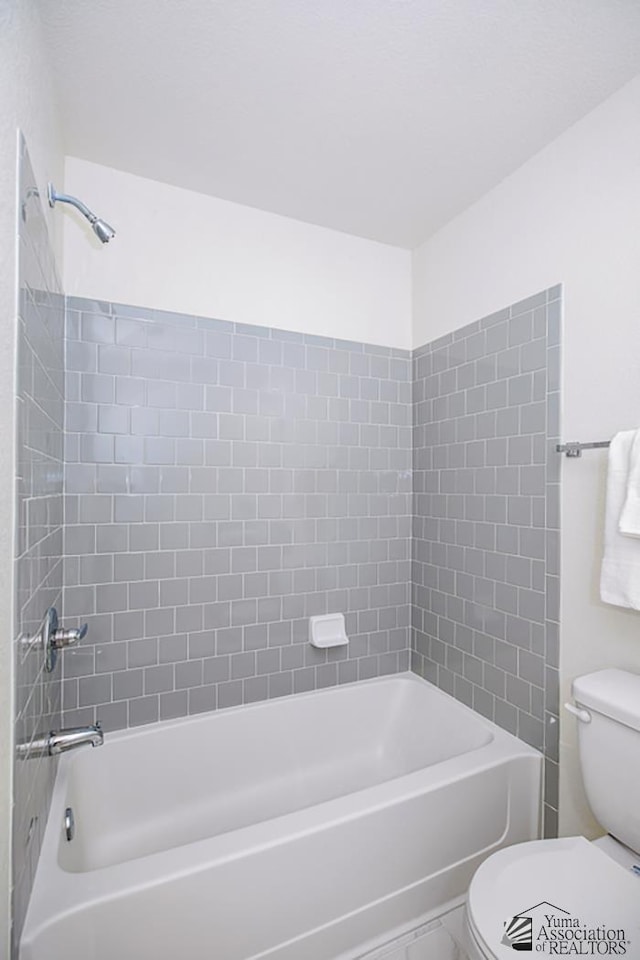 full bathroom with toilet and shower / tub combination