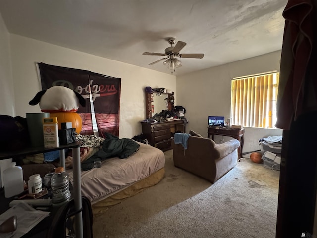 carpeted bedroom featuring a ceiling fan