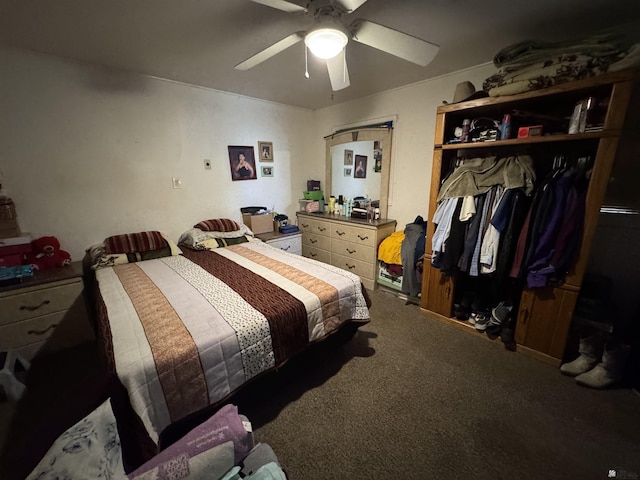 bedroom with ceiling fan and carpet floors