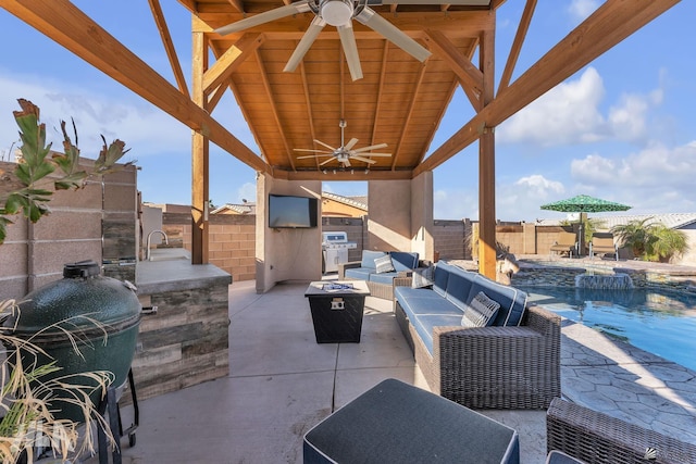 11812 E Eclipse Ct, Yuma, AZ 85367 - view of patio featuring area for grilling, ceiling fan, outdoor lounge area, and a fenced backyard