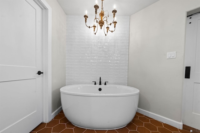 10369 S Fairway Loop, Yuma, AZ 85367 - bathroom with a freestanding bath, tile patterned floors, and a chandelier