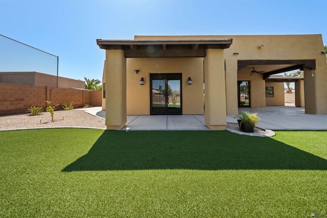 10369 S Fairway Loop, Yuma, AZ 85367 - back of property with stucco siding and a patio area