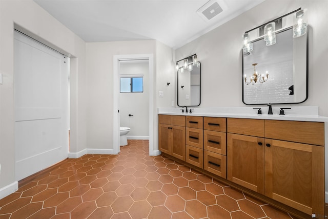 10369 S Fairway Loop, Yuma, AZ 85367 - bathroom with double vanity, tile patterned flooring, and a chandelier