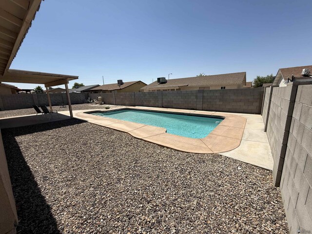 6347 E 44th Pl, Yuma, AZ 85365 - view of pool with a patio area and a fenced backyard
