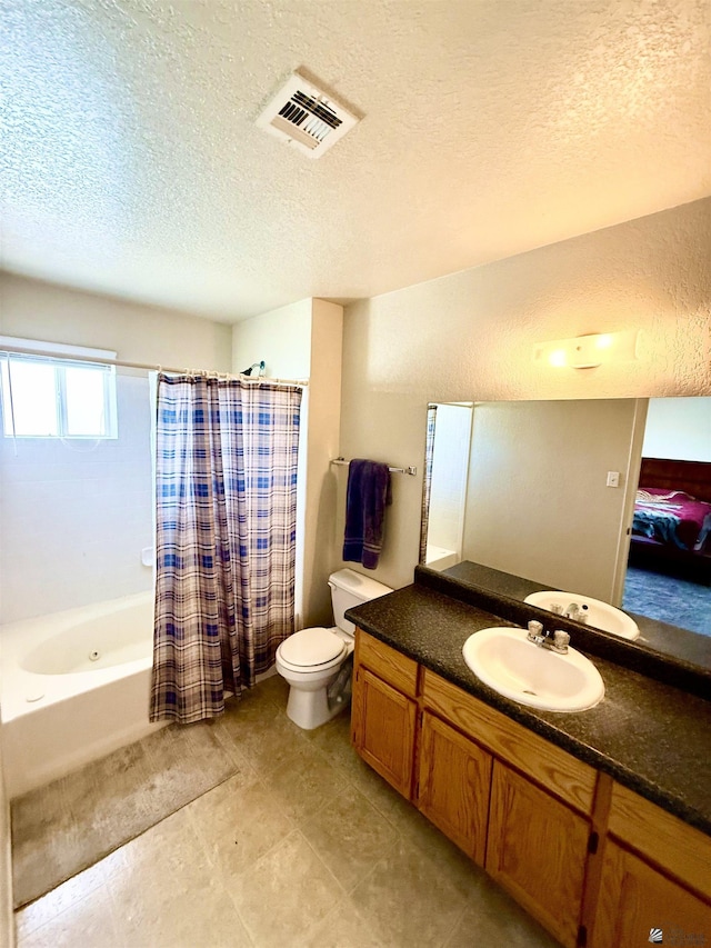 6347 E 44th Pl, Yuma, AZ 85365 - full bathroom with vanity, a textured ceiling, and shower / bath combo with shower curtain