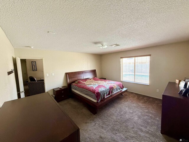 6347 E 44th Pl, Yuma, AZ 85365 - carpeted bedroom with a textured ceiling