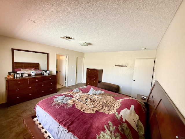 6347 E 44th Pl, Yuma, AZ 85365 - bedroom featuring dark colored carpet and a textured ceiling
