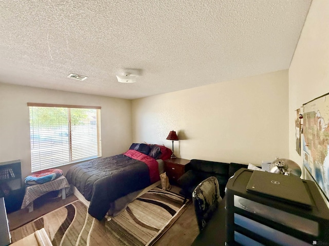 6347 E 44th Pl, Yuma, AZ 85365 - bedroom featuring a textured ceiling
