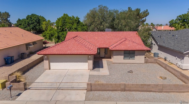 10266 S Del Rico, Yuma, AZ 85367 - single story home featuring a tiled roof, driveway, fence private yard, an attached garage, and stucco siding