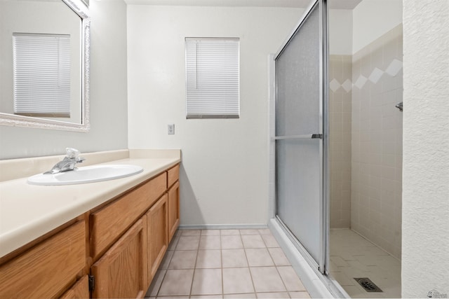 10266 S Del Rico, Yuma, AZ 85367 - bathroom with vanity, tile patterned flooring, and a stall shower