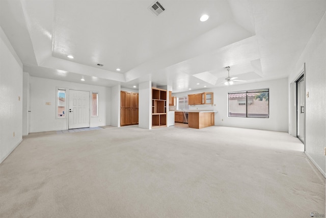 10266 S Del Rico, Yuma, AZ 85367 - unfurnished living room with recessed lighting, a tray ceiling, visible vents, and ceiling fan