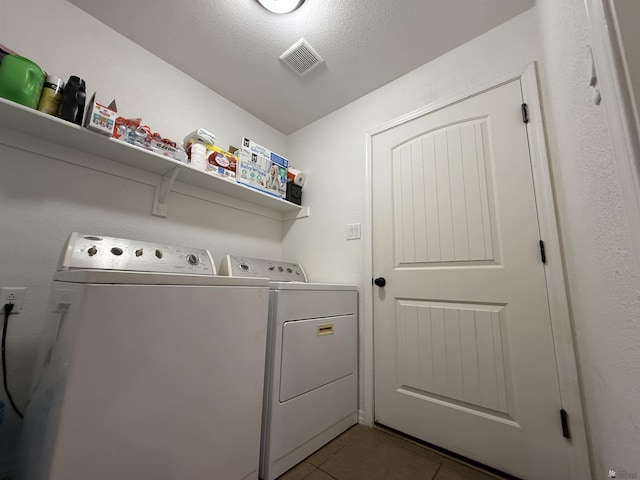 126 N Joe Harper Ct, San Luis, AZ 85349 - laundry room featuring washing machine and clothes dryer and tile patterned floors