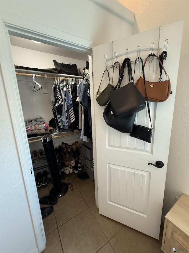 126 N Joe Harper Ct, San Luis, AZ 85349 - walk in closet featuring tile patterned floors