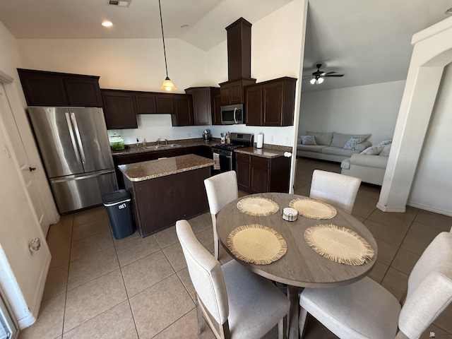 126 N Joe Harper Ct, San Luis, AZ 85349 - dining area with a ceiling fan, light tile patterned floors, and high vaulted ceiling
