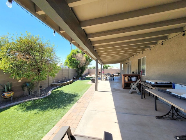 2193 S 40th Dr, Yuma, AZ 85364 - fenced backyard with a patio area and outdoor dining space