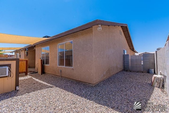 6324 E 45th Ln, Yuma, AZ 85365 - view of home's exterior featuring a fenced backyard and stucco siding