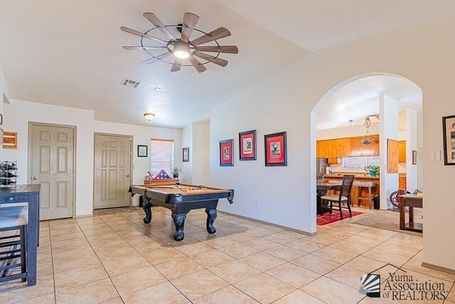 6324 E 45th Ln, Yuma, AZ 85365 - rec room featuring ceiling fan, arched walkways, pool table, light tile patterned flooring, and vaulted ceiling