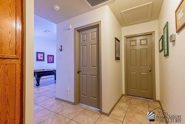 6324 E 45th Ln, Yuma, AZ 85365 - hallway featuring light tile patterned flooring and baseboards