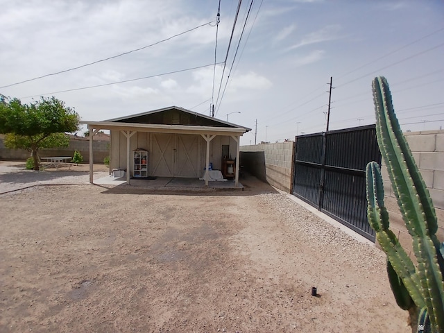view of outdoor structure with fence private yard