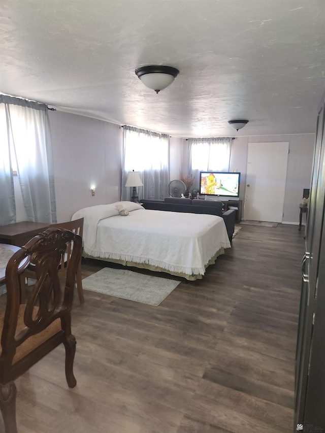 bedroom with wood finished floors