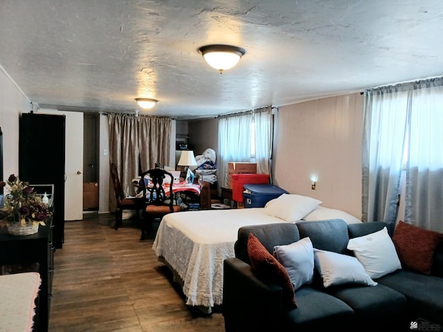 bedroom featuring wood finished floors