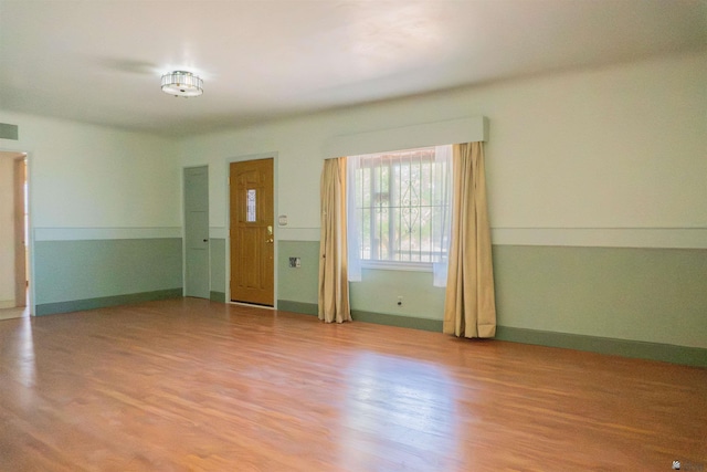 577 S 8th Ave, Yuma, AZ 85364 - empty room featuring wood finished floors and baseboards