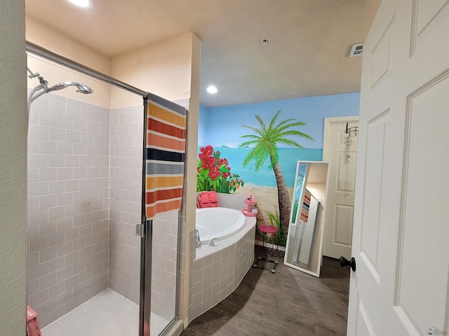 7270 E 38th Ln, Yuma, AZ 85365 - full bathroom featuring a shower stall, wood finished floors, a garden tub, and recessed lighting