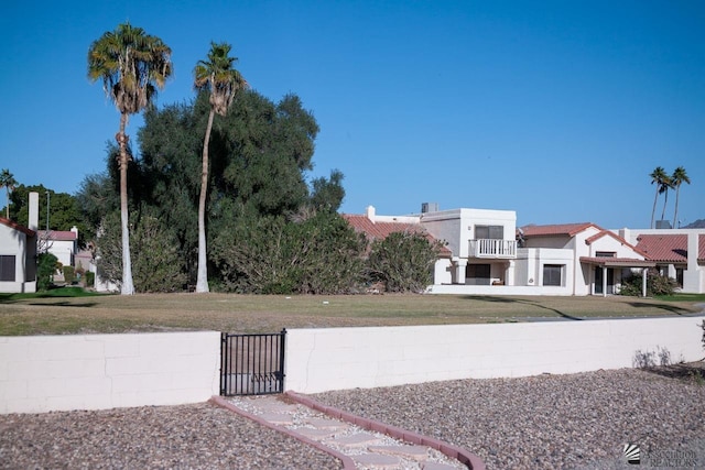 view of yard with a gate