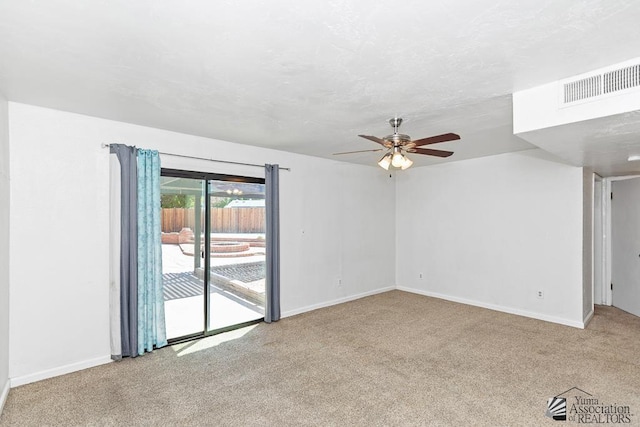 1344 W 13th St, Yuma, AZ 85364 - unfurnished room featuring carpet flooring, ceiling fan, and baseboards
