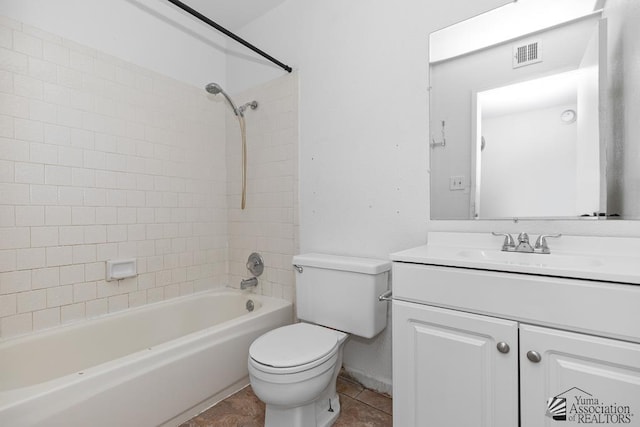 1344 W 13th St, Yuma, AZ 85364 - bathroom featuring vanity, toilet, shower / tub combination, and tile patterned floors