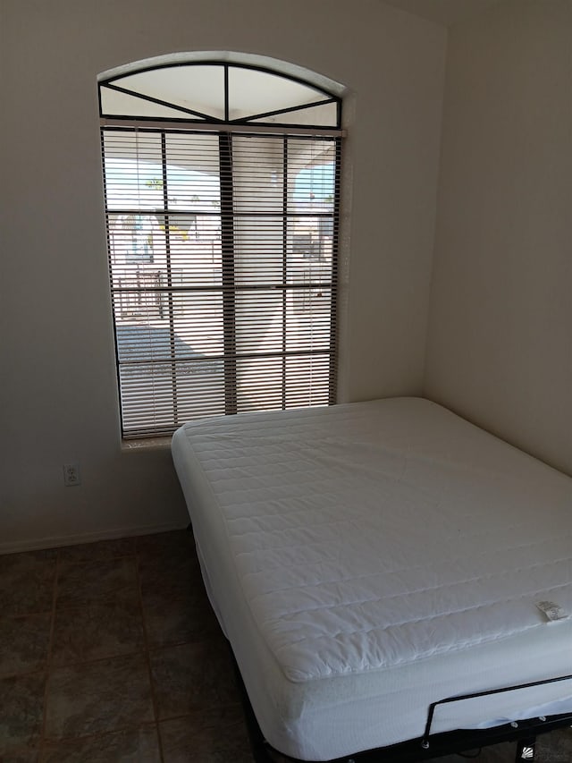 13835 E 51st Ln, Yuma, AZ 85367 - tiled bedroom featuring baseboards