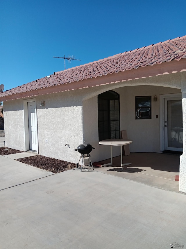 13835 E 51st Ln, Yuma, AZ 85367 - back of house featuring a patio and stucco siding