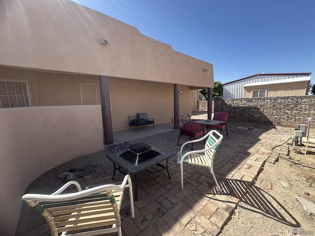 view of patio with fence