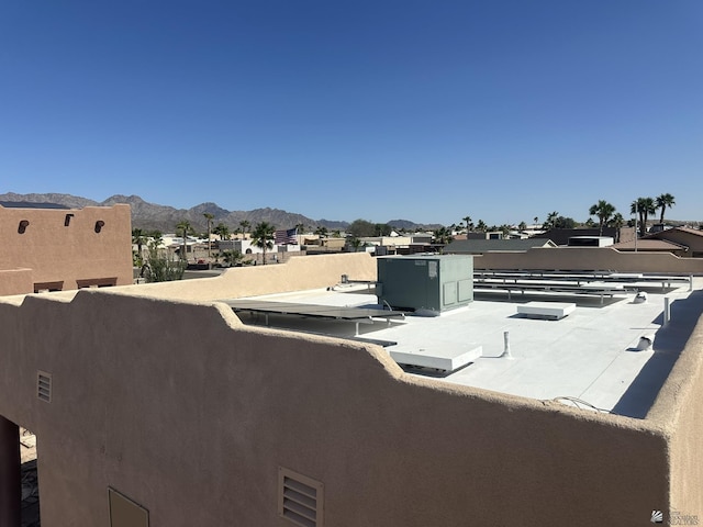 exterior details with a residential view, a mountain view, and visible vents
