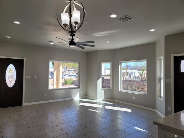 13129 E 47th Ln, Yuma, AZ 85367 - tiled entrance foyer featuring plenty of natural light, ceiling fan with notable chandelier, recessed lighting, and visible vents